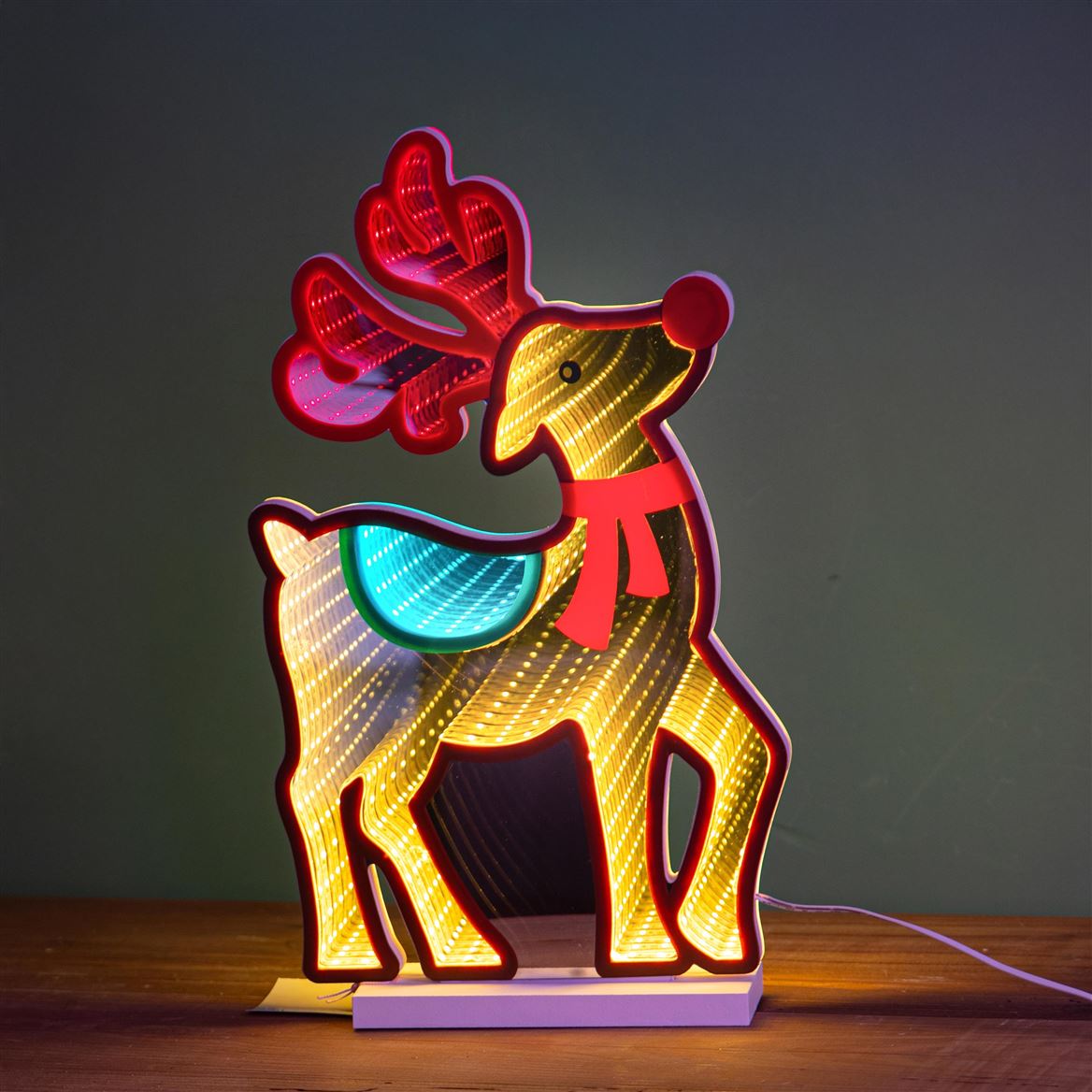 Xmas. Renna 15xh.28cm Led Infinity Con Base